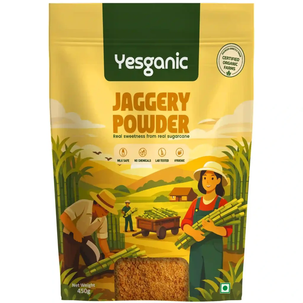 Front view of Yesganic organic jaggery powder 450g pouch featuring a sugarcane farm illustration.