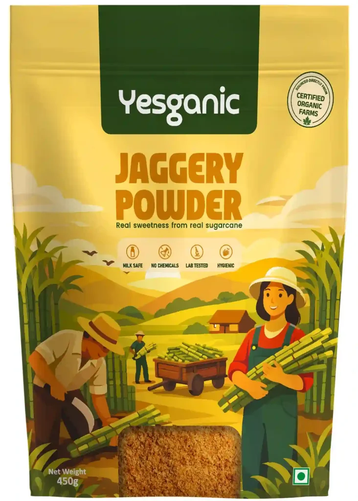 Front view of Yesganic organic jaggery powder 450g pouch featuring a sugarcane farm illustration.